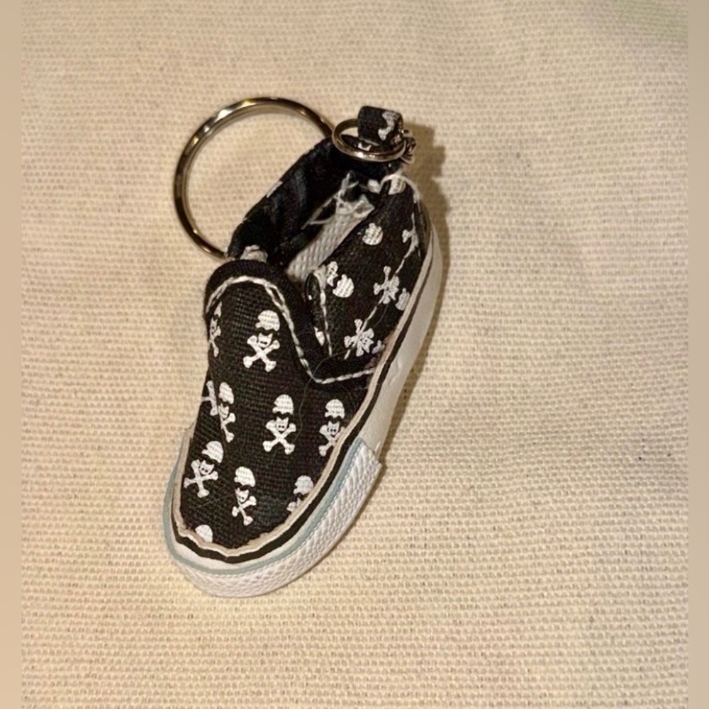 90s Vintage from Shoe Keychain charm. Similar to Vans. Black with skulls